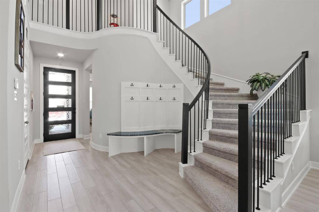 Beautiful entry with custom MUD area that was added as a beautiful accent.