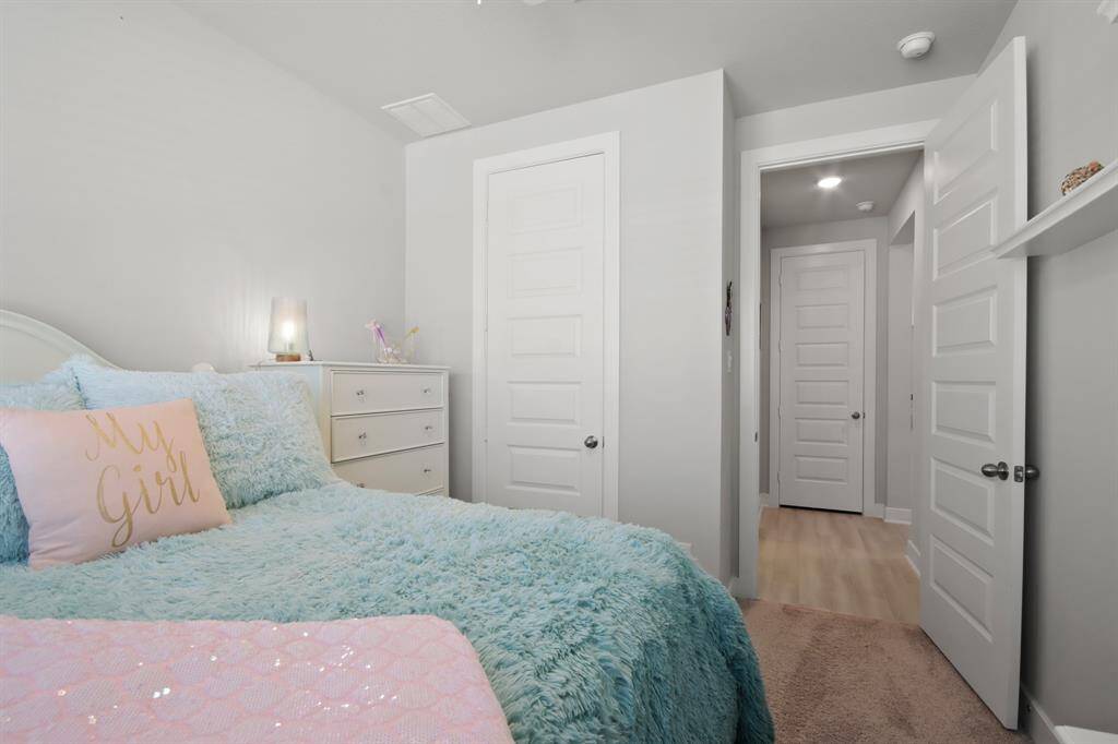 Spare bedroom has a full bathroom off the hallway.
