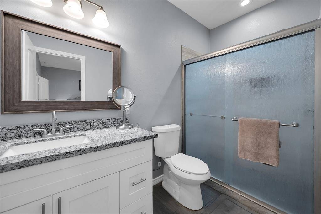 Secondary bathroom with amazing counterspace.