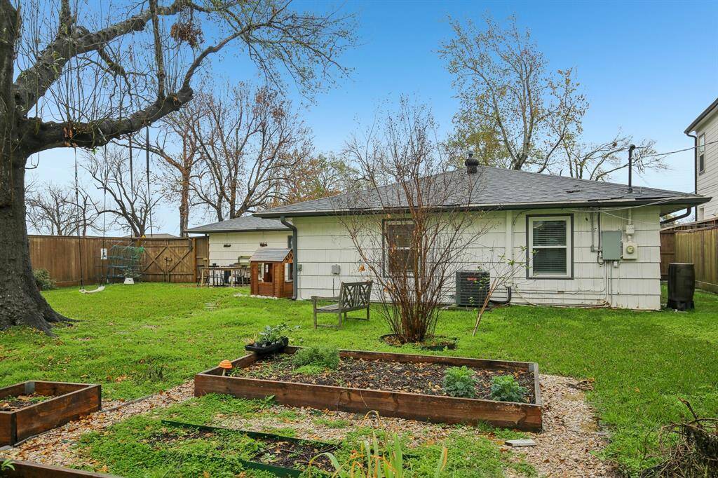 Yard with garden beds.