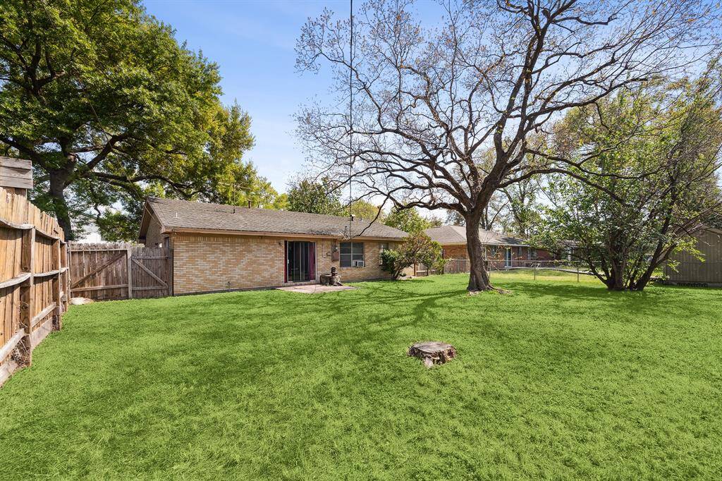 Large lot has endless opportunity.