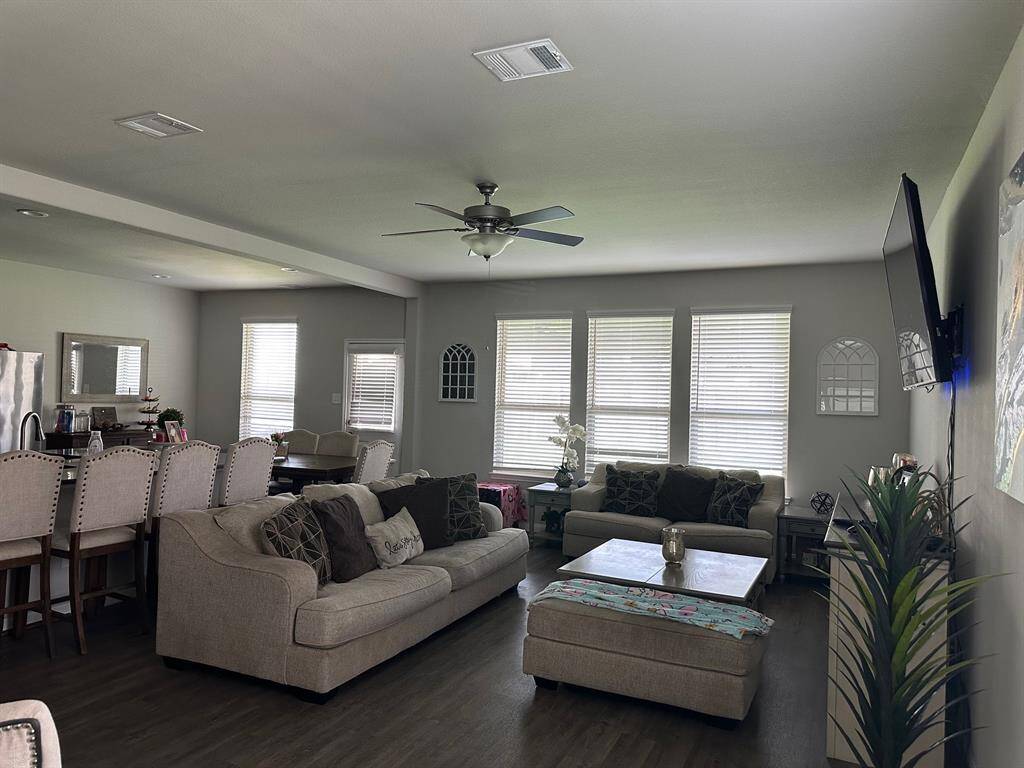Open concept kitchen, dining and living area.