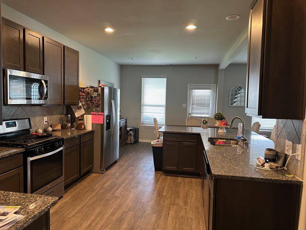 Entertainers kitchen with plenty of counter space.