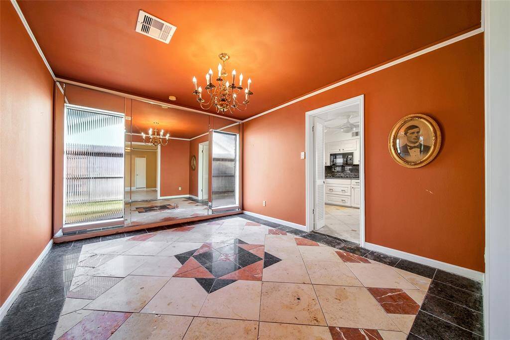 Formal dining room that leads directly into the kitchen.