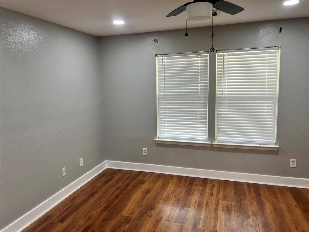 MASTER BEDROOM WITH LAMINATE WOOD DOUBLE WINDOW