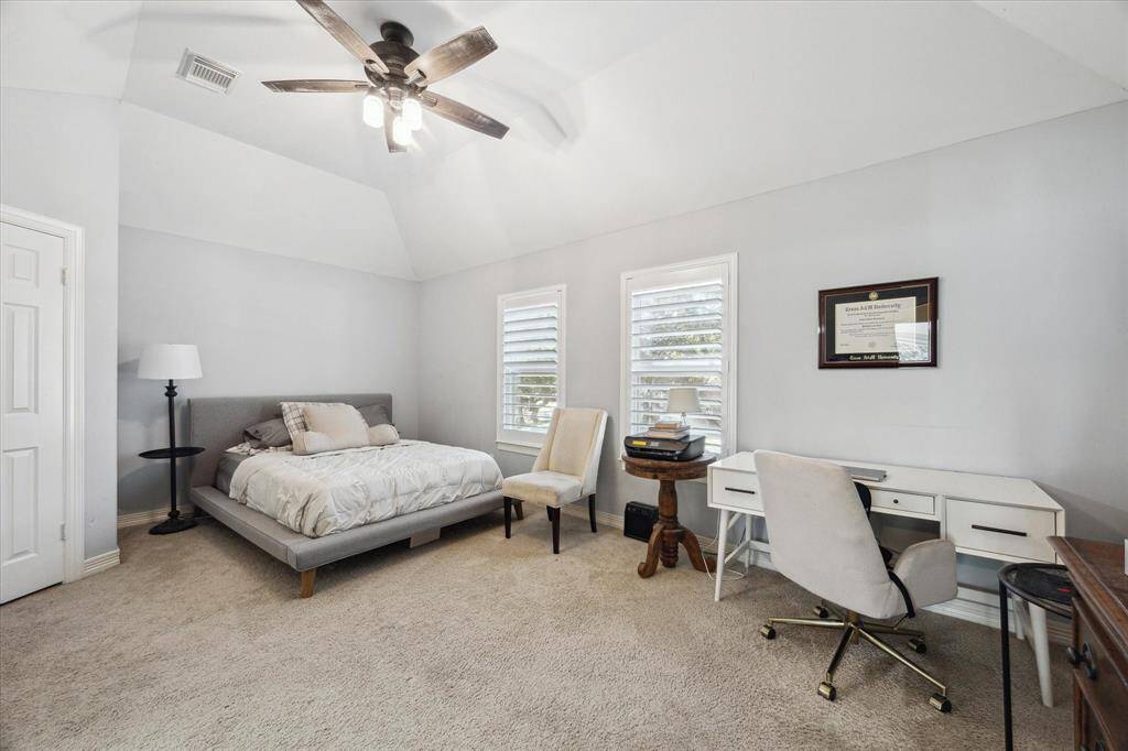 Upper level bedroom 2. This bedroom features carpet floor, high ceiling, walk-in closet and access to Jack-n-Jill bathroom.