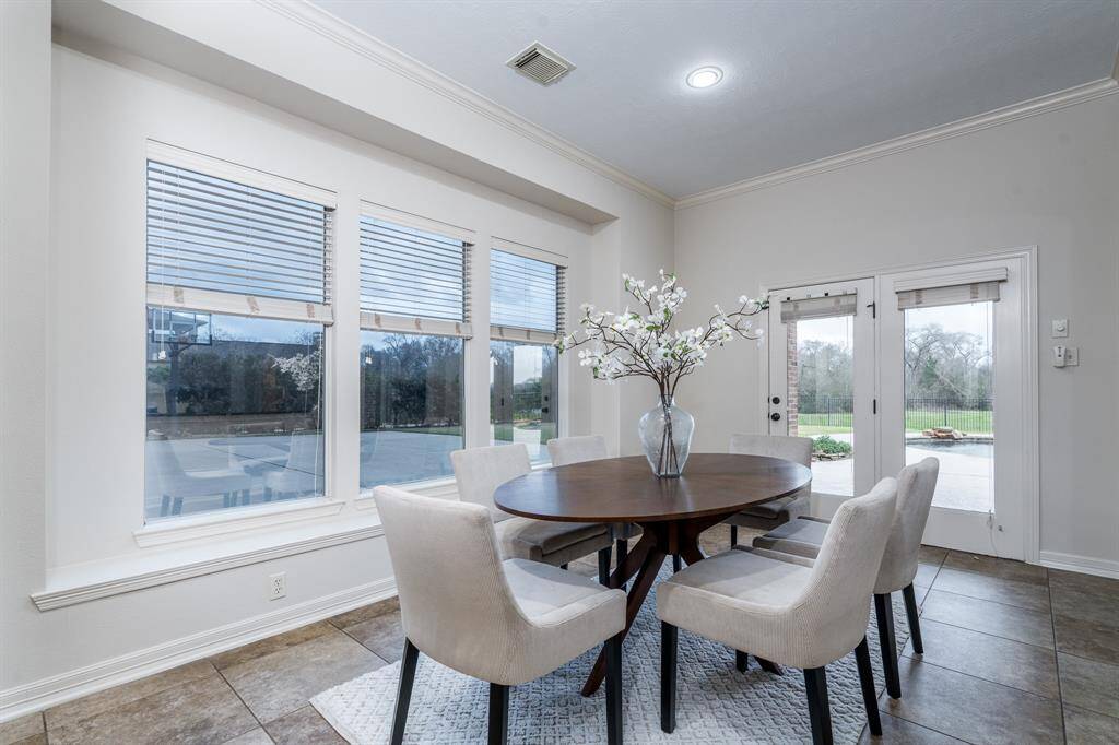 The living area flows into the large breakfast area.