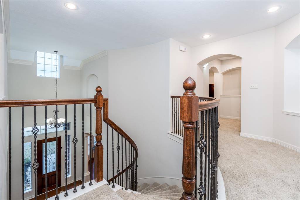 Head upstairs to the expansive second floor.