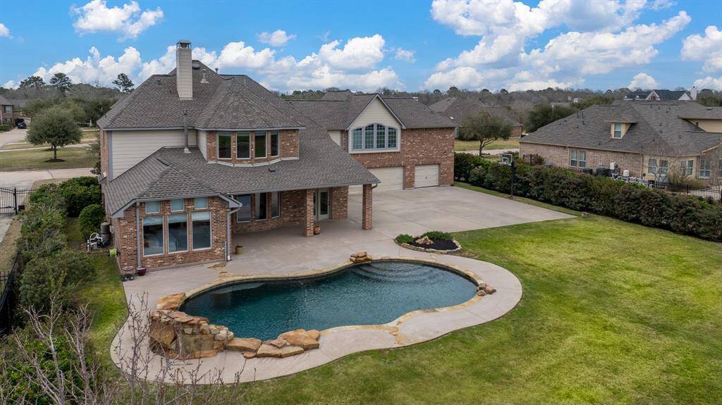 With over 4,000 square feet of living space, four bedrooms, four and a half bathrooms, and a three-car garage, this home is designed for both relaxed family living and elegant entertaining.