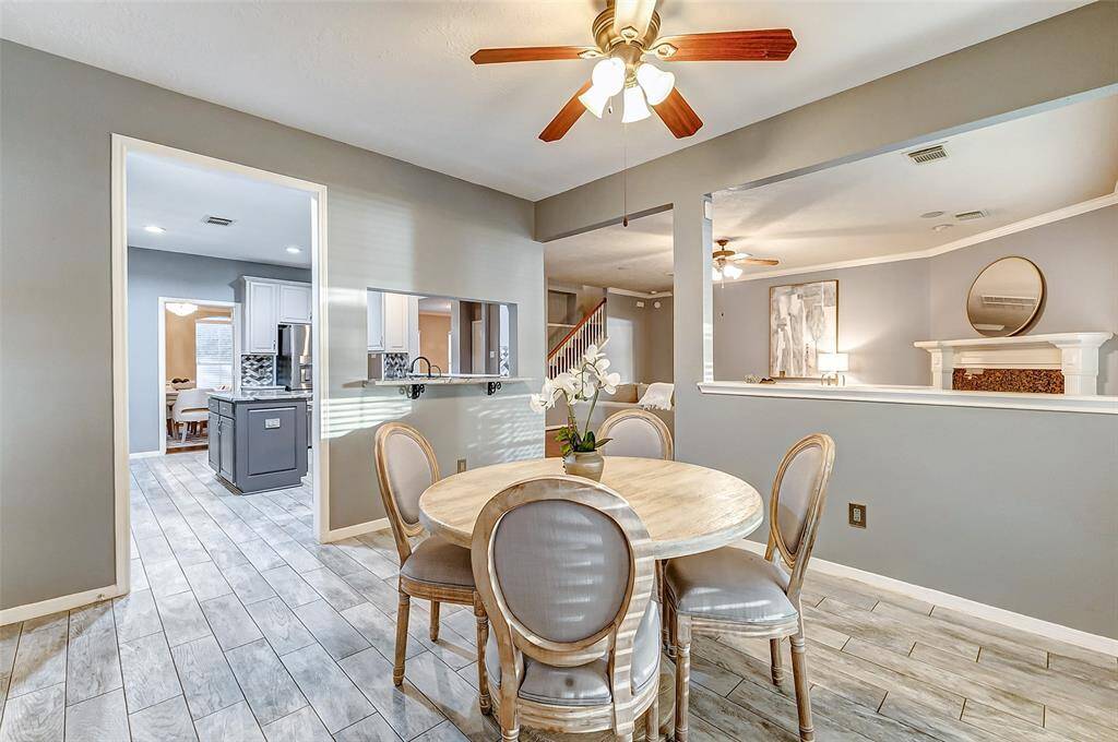 The breakfast area offers ample space for a cozy table, perfect for casual meals.