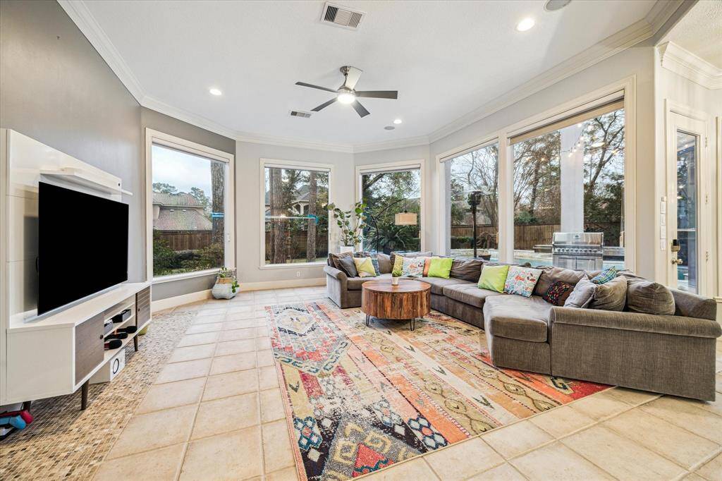 Enjoy movie time with the family in this spacious family rooms with tons of windows.