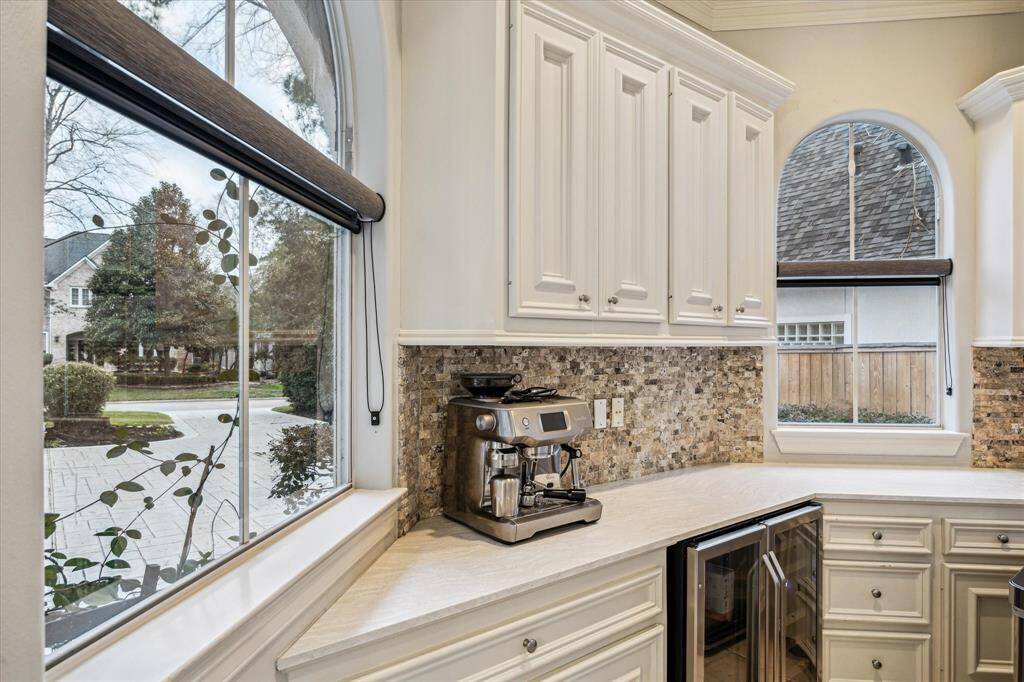 Serve up your favorite sip of something with this coffee bar and beverage cooler.