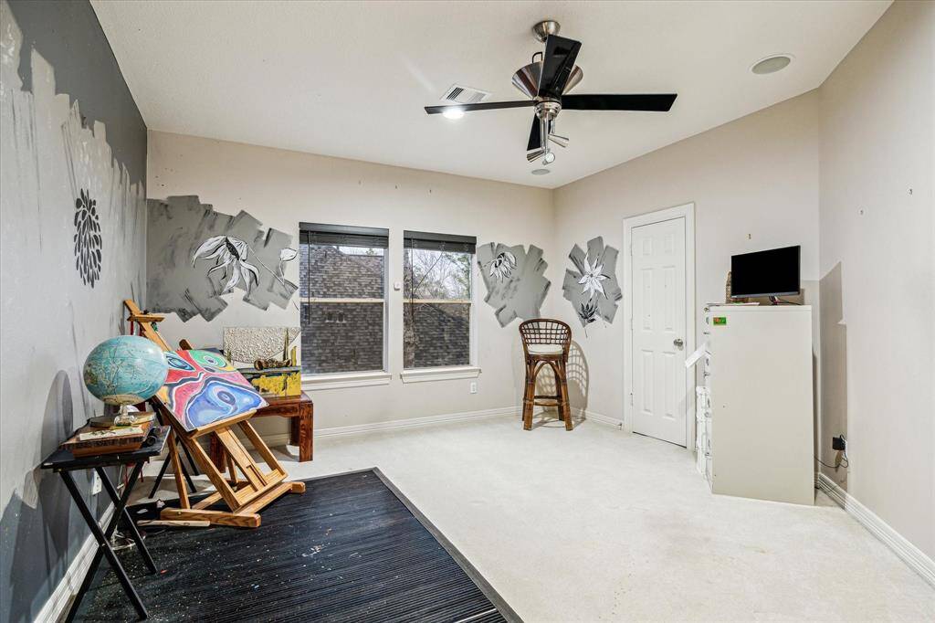 Another secondary bedroom also makes an excellent area for an art studio or creative space.