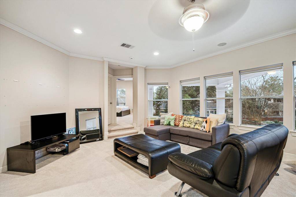The second-floor family room is a welcome gathering space for movies and game night.