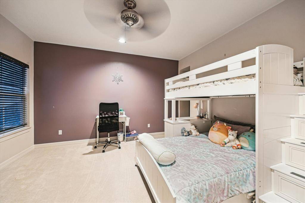 The adorable bunkroom is a fun hideout for the kids and sleepover guests.