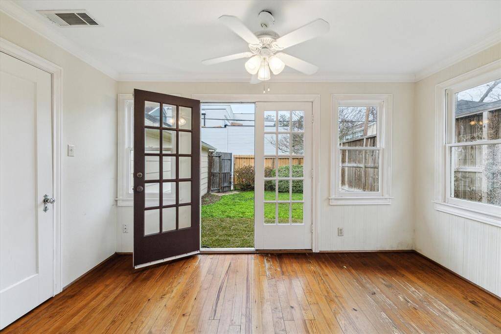 Sitting room/office conveniently located off the primary bedroom with access and views to the backyard.