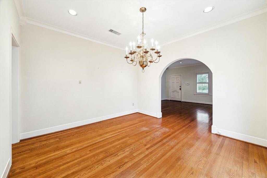 Gracious dining room perfectly accommodates either a round or rectangular table.
