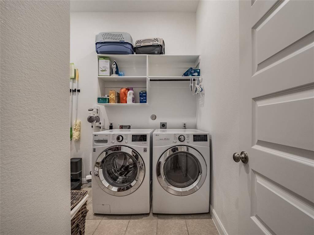 very large laundry room shelves and storage washer and dryer stay with sale of home
