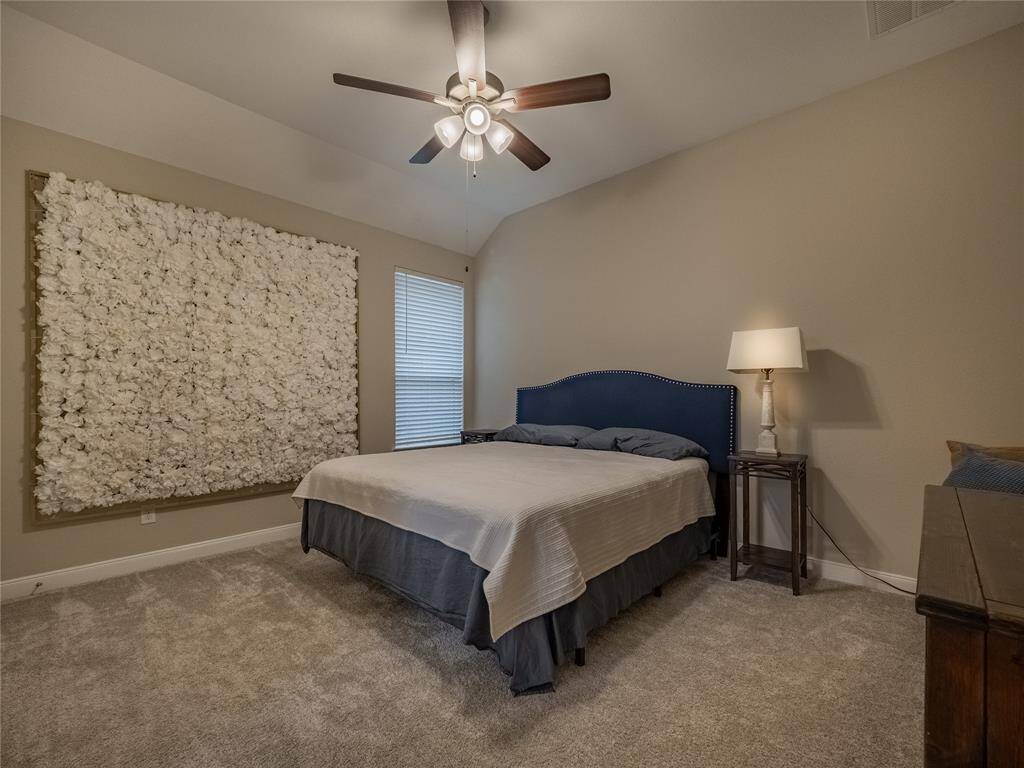 guest bedroom with private bath on the back side of the home