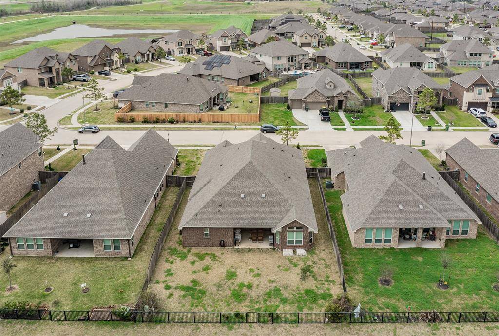 aerial view from the rear and gives you a Birdseye view of the surrounding neighbors
