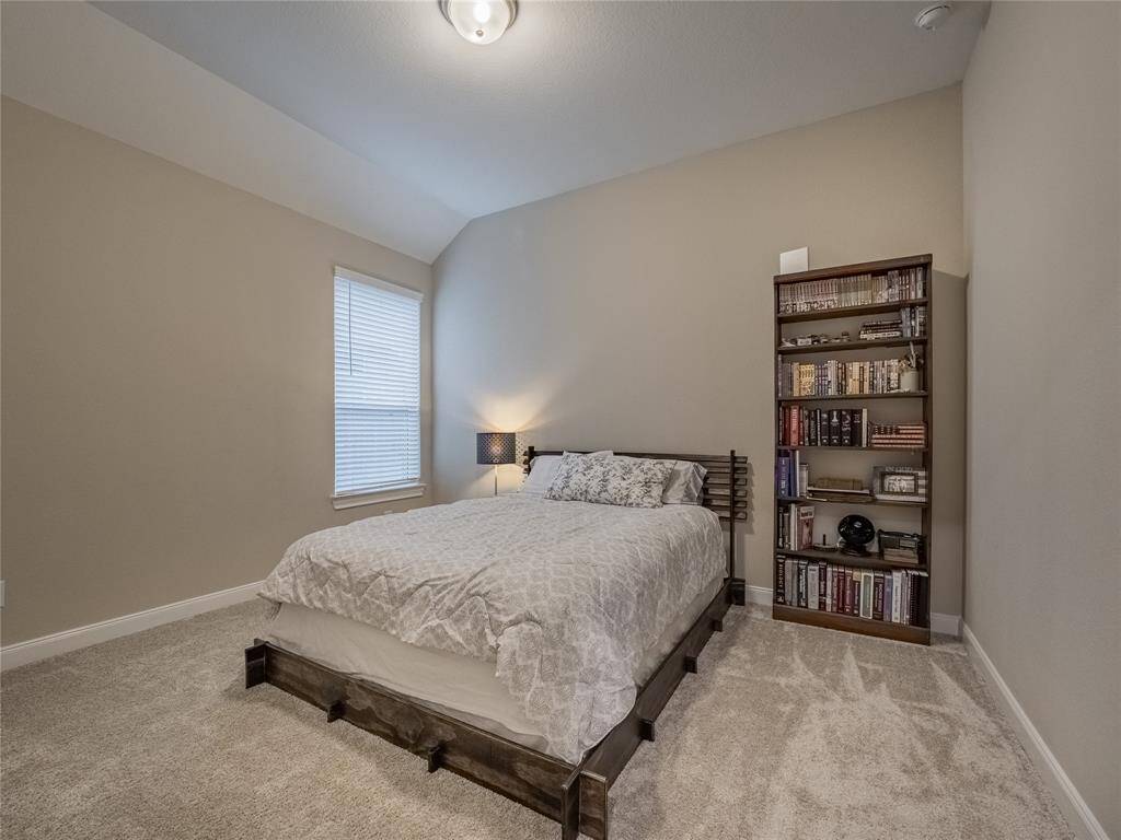 one of two bedrooms in the front of the home,