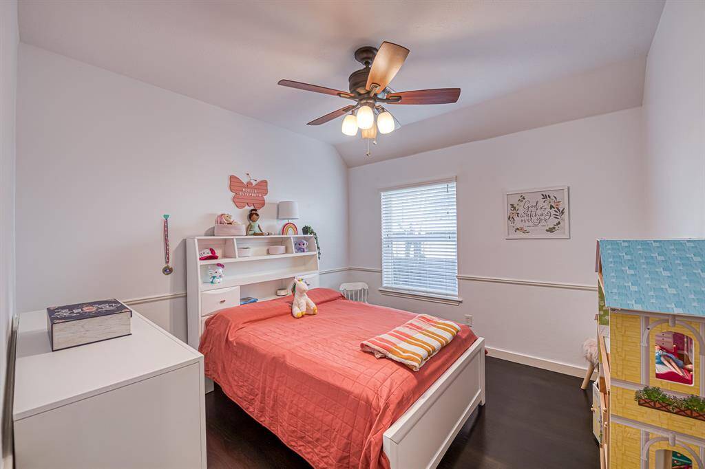 Secondary bedroom w/wood floors
