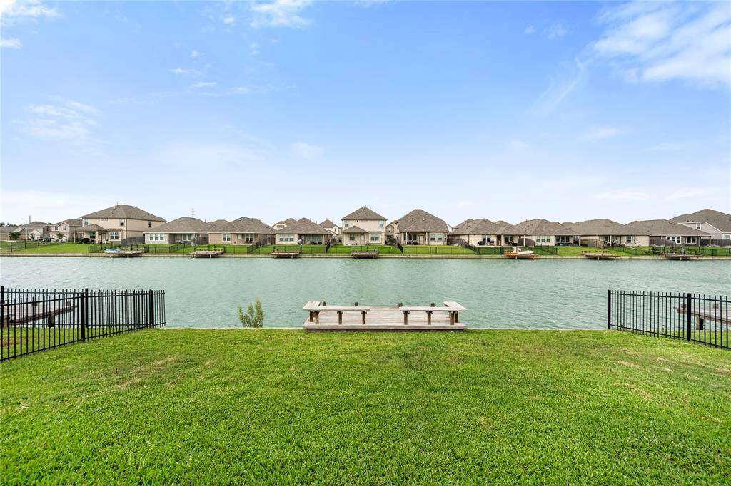 Located in peaceful Camillo Lakes, this waterfront gem blends luxury and comfort—zoned to top Katy ISD schools and steps from scenic lakeside living.