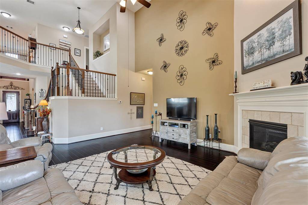 Another view of the flow of the downstairs. The hallway leads to the primary suite.