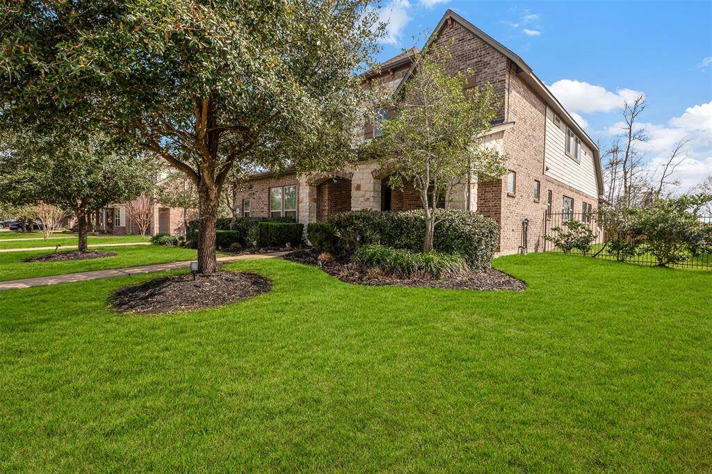 This oversized lot located on a cul de sac has plenty of room to play and a view of the walking trail/pond from the front yard.