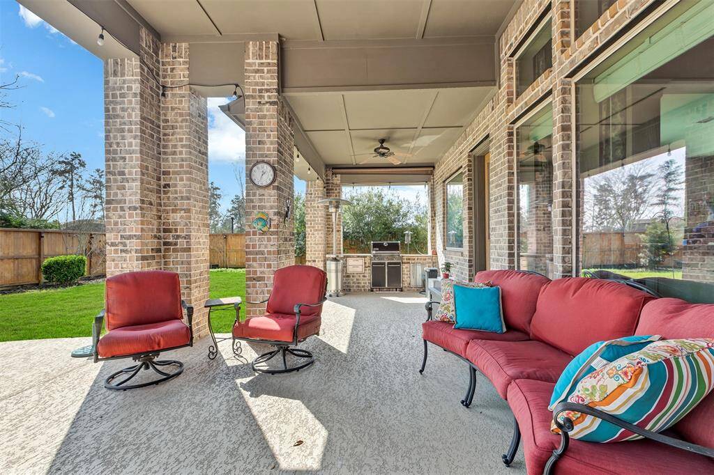 The covered patio is quite immense. No shortage of space.