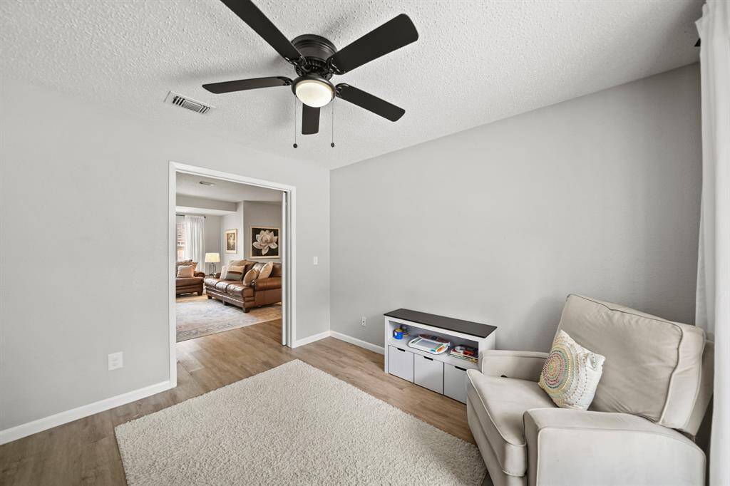 Ideal as a study, this space includes a wardrobe storage closet and could easily serve as a fourth bedroom, nursery, child's play area, etc.