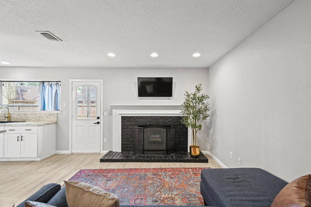 Included is pre-wiring for a wall mounted flat screen TV.
