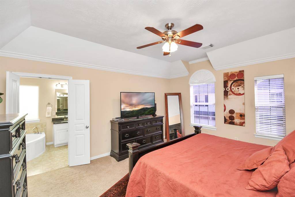 Another view of the spacious primary bedroom