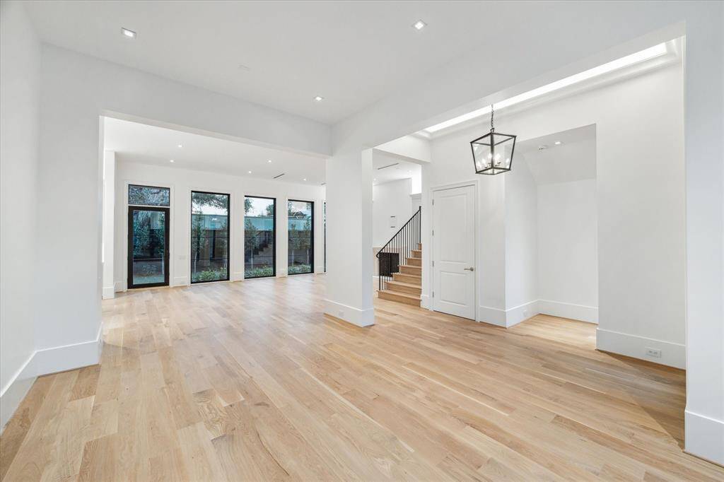 [Dining and Living Rooms]This view travels from the dining room into the living room.
