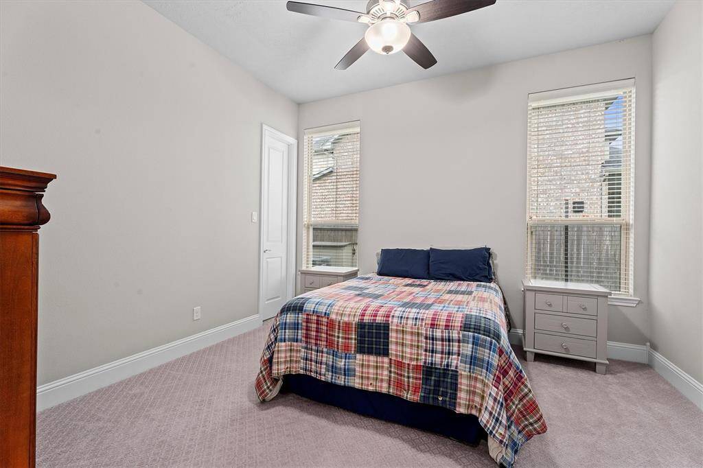 Full bath ensuite includes walk in shower.