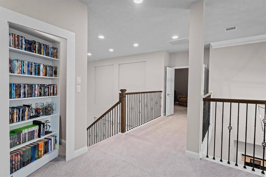 Spacious game room has plenty of room for pool table or whatever you might light to put in here.