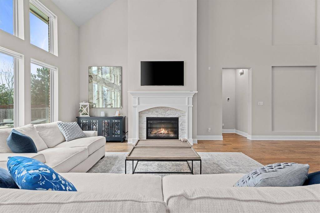 Sophisticated fireplace acts as a focal point in this spacious great room.