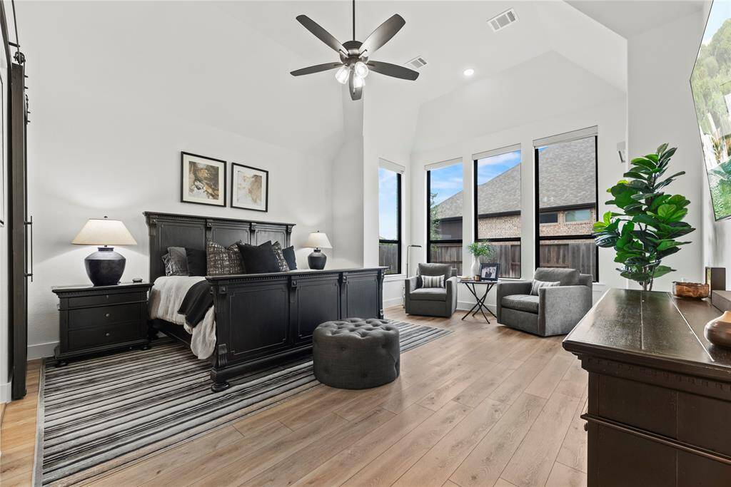 How perfect is this primary suite? Spacious and filled with natural light, this serene retreat offers the ultimate escape, promising comfort, tranquility, and pure relaxation.
