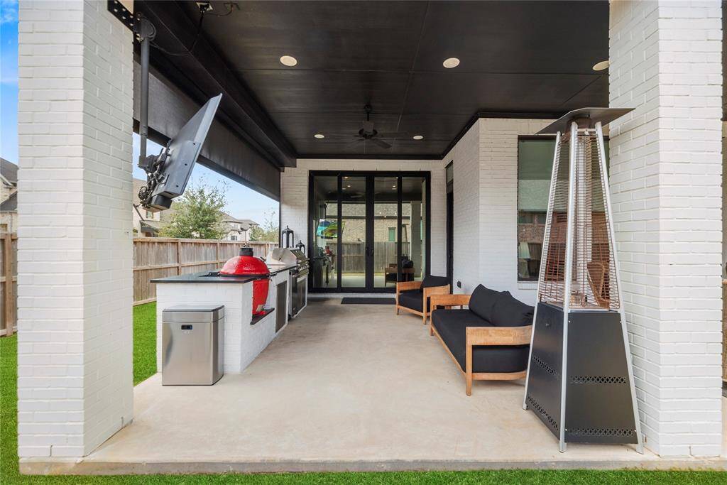 The patio with outdoor kitchen is a great place to barbecue for family and friends. Can you picture yourself sitting back and just enjoying space?