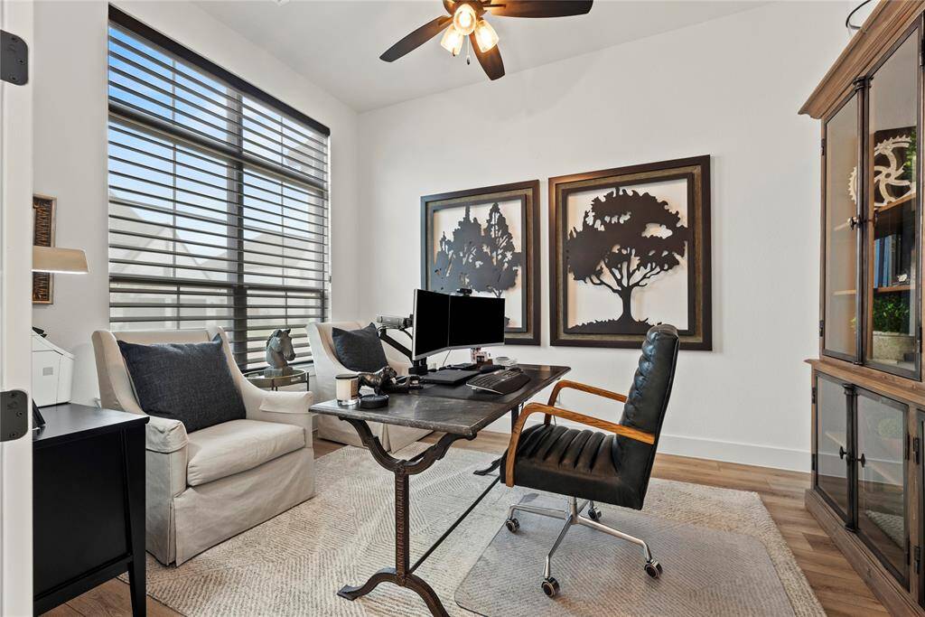 A private study through double glass doors adds a touch of sophistication and privacy to the home. It suggests a space dedicated to concentration, creativity, and productivity.
