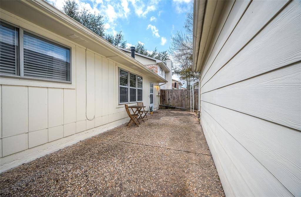 View as you come from your own personal 2-car garage. Yes, that's cement board on the exterior. Just one more low maintenance feature giving you more time to enjoy life in Spring Branch!