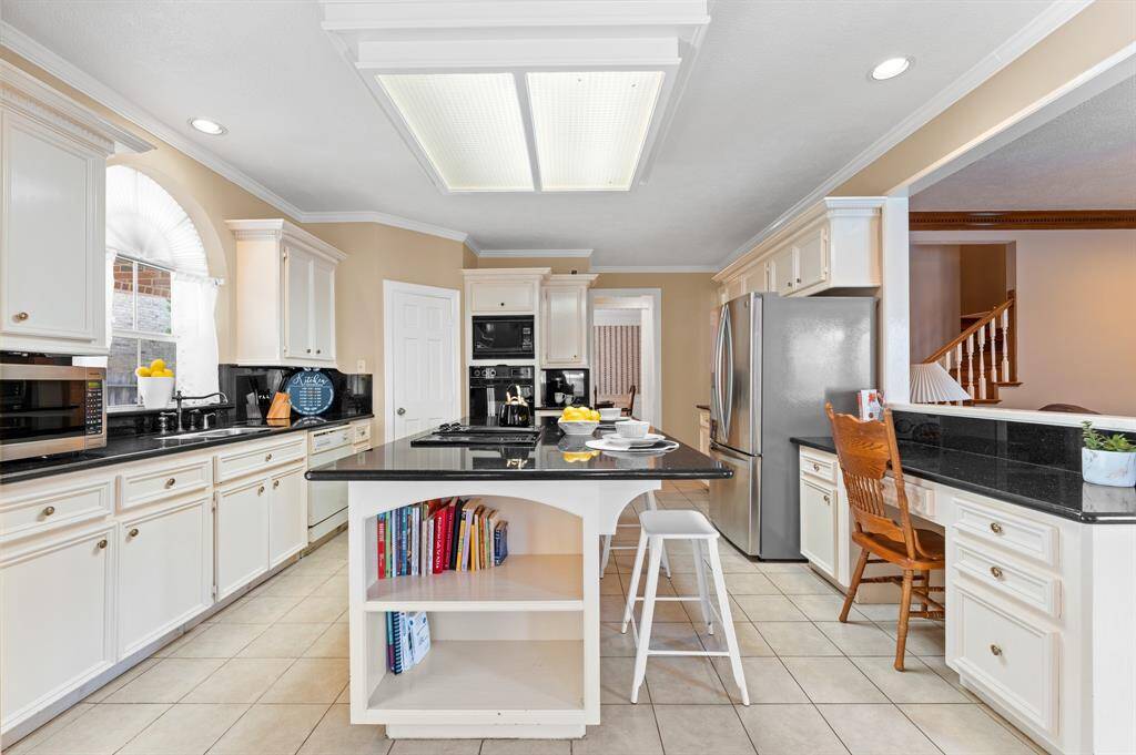 Large kitchen with built in desk