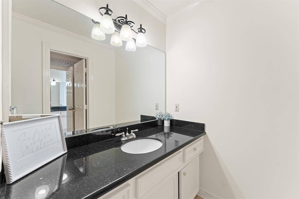 Jack and jill bathroom with access to bedroom 2 and 3 with tub/shower combo