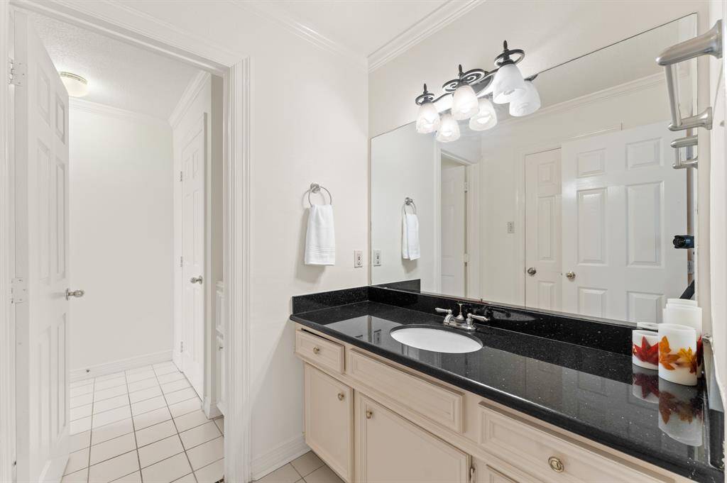 Jack and jill bathroom with access to bedroom 4 and 5 with tub/shower combo and a large linen closet