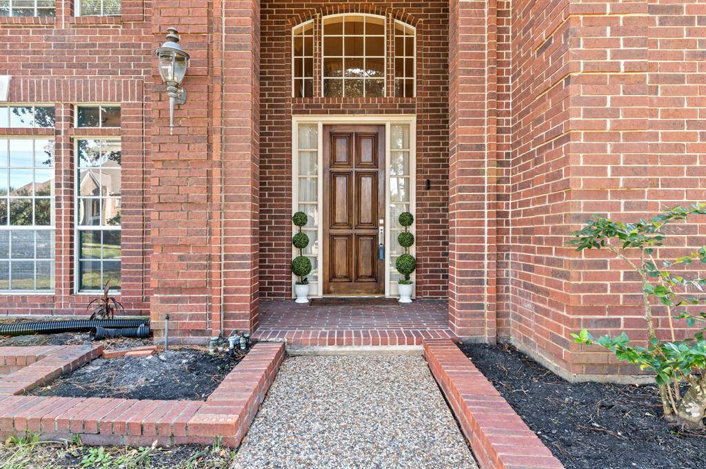 Large front door with covered porch