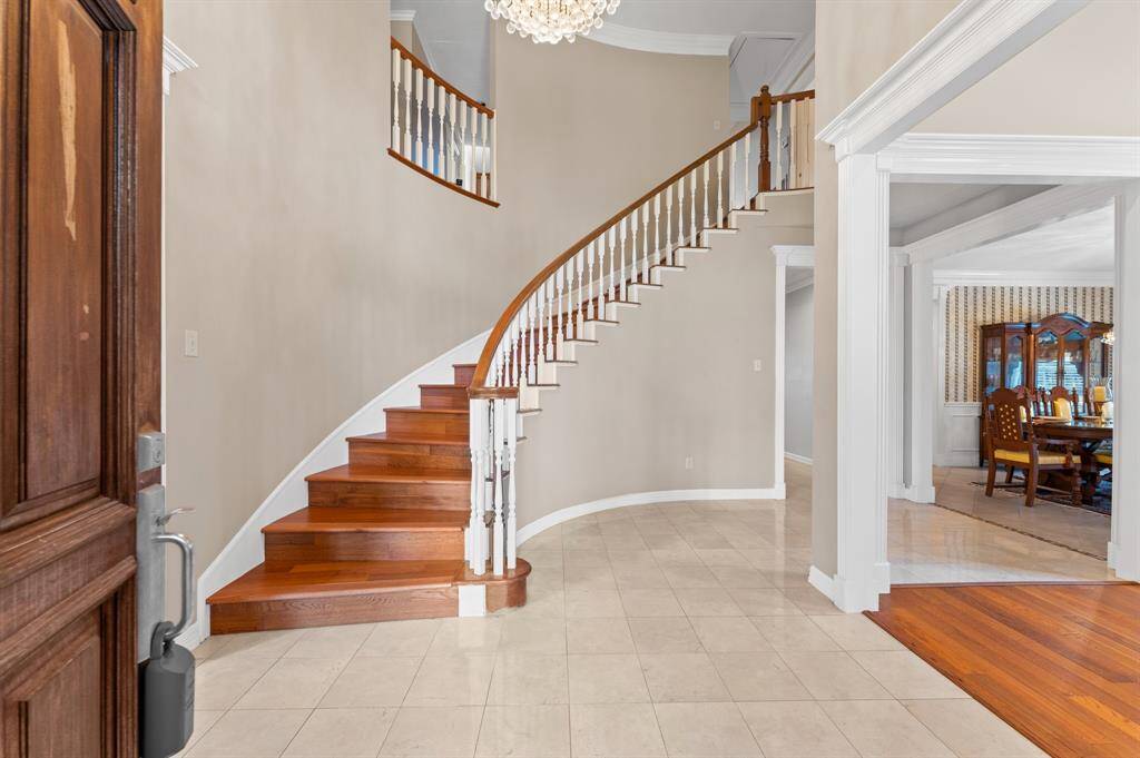 Spiral front staircase upon entry