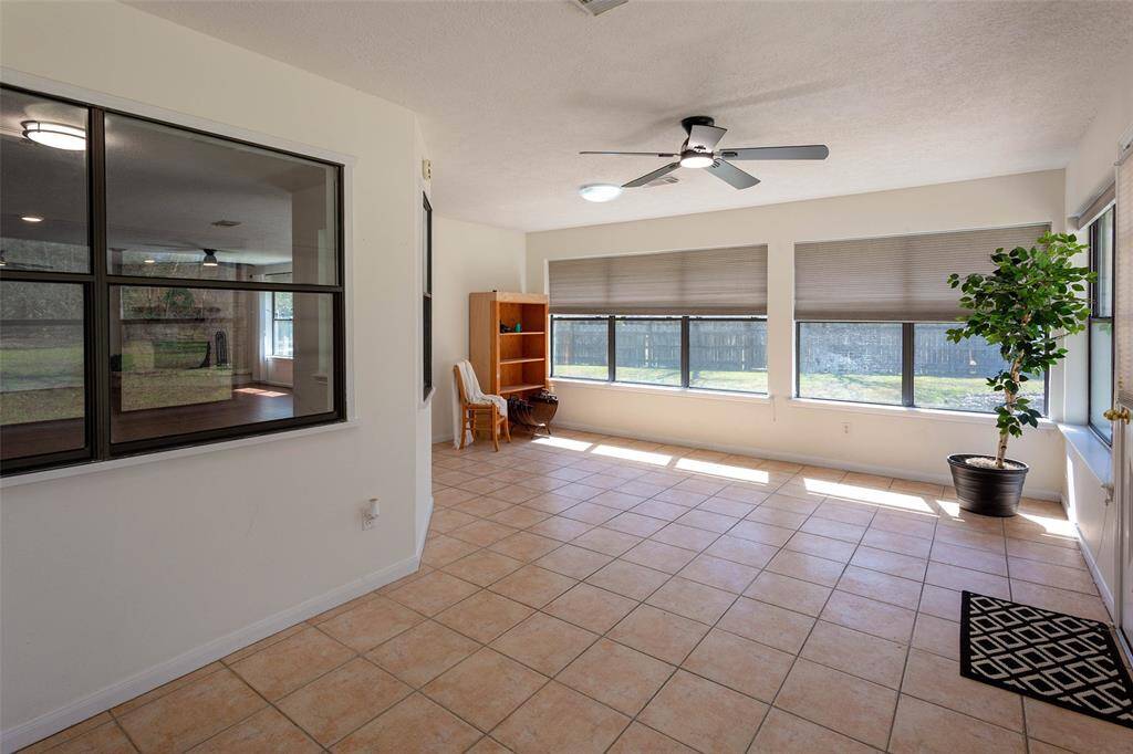 view of sunroom with walls of windows