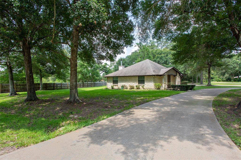 corner lot, circle driveway in front, beautiful shade trees, extended driveway and garage along maple st. You need to see the space available here!