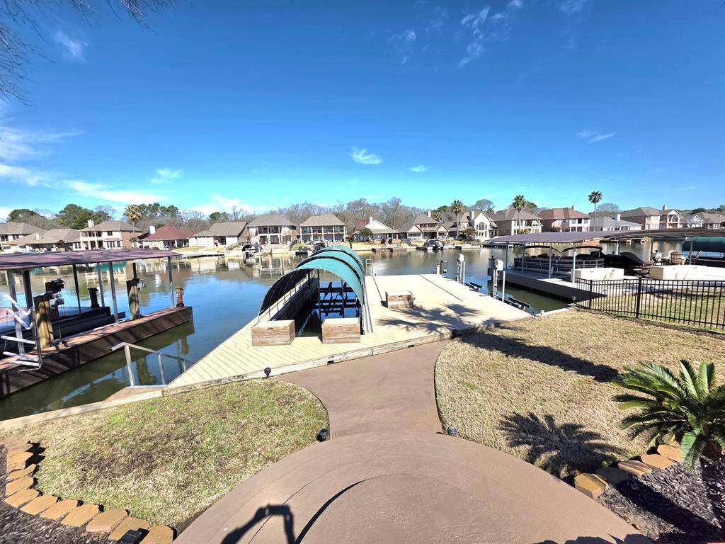 Covered boat slip 40' long, plus a trex deck with an area for another boat slip, if needed. Plus, two jet ski lifts.