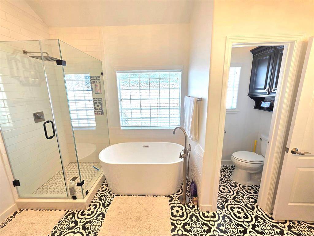 Another view of the tub and shower